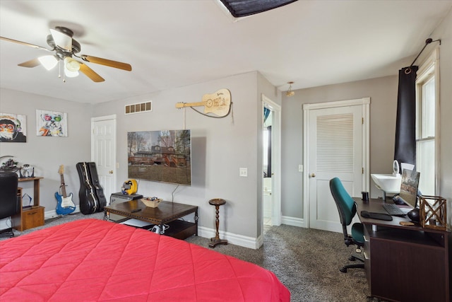 carpeted bedroom featuring baseboards, visible vents, ceiling fan, and a closet