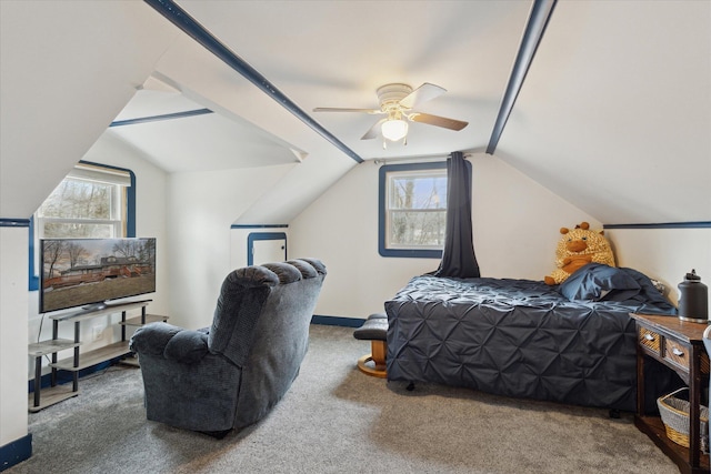 carpeted bedroom with lofted ceiling and ceiling fan