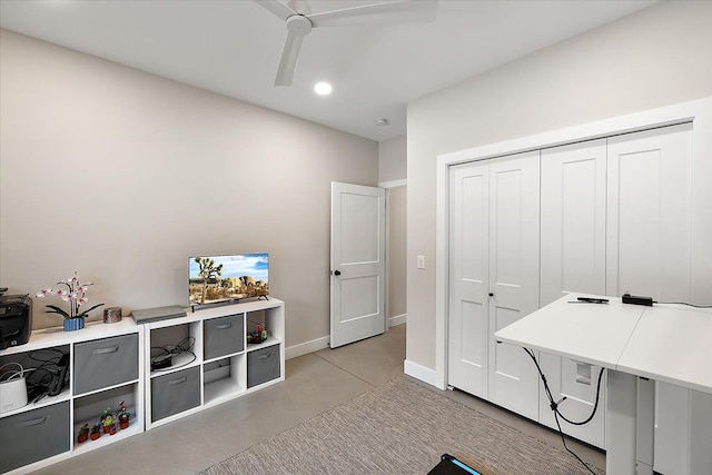 office space featuring ceiling fan, baseboards, concrete flooring, and recessed lighting