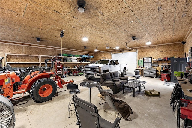 garage with a workshop area