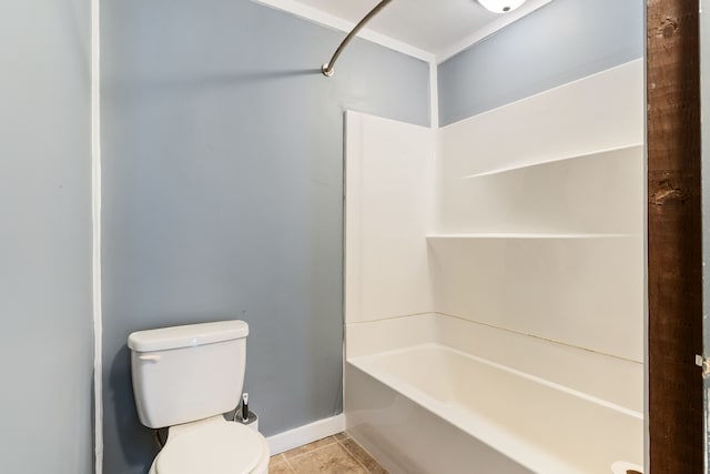 bathroom with shower / bathtub combination, baseboards, toilet, and tile patterned floors