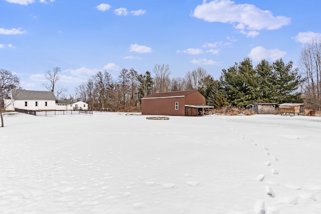 view of yard covered in snow