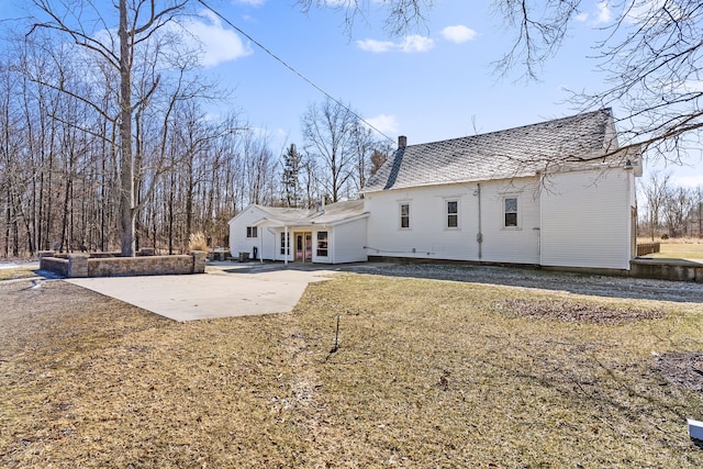 rear view of house with a patio area