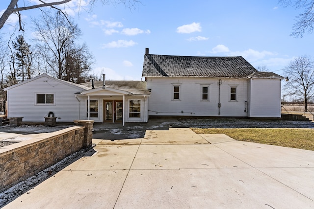 view of front of house featuring french doors and a patio