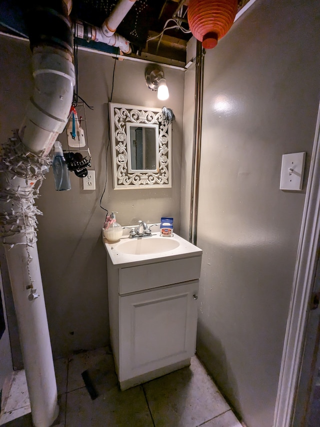 bathroom with vanity and tile patterned floors