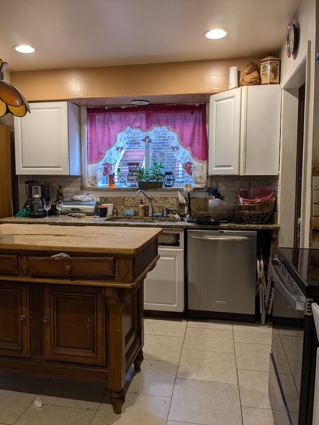 kitchen with a sink, white cabinetry, black electric range, backsplash, and dishwasher