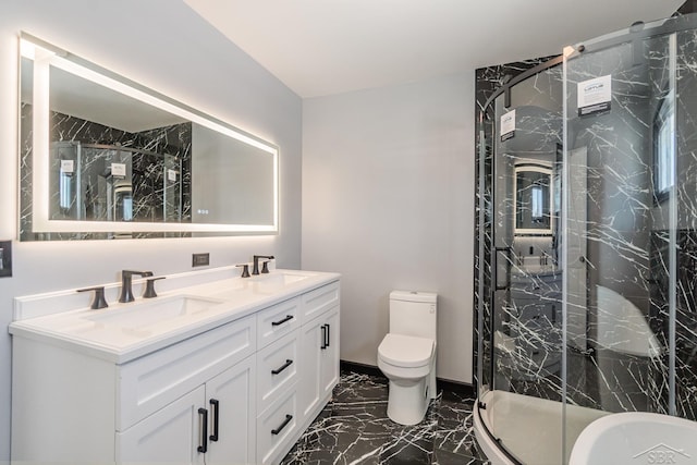 full bath featuring double vanity, marble finish floor, a marble finish shower, and a sink