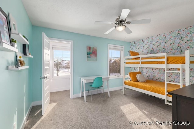 bedroom featuring carpet, ceiling fan, and baseboards