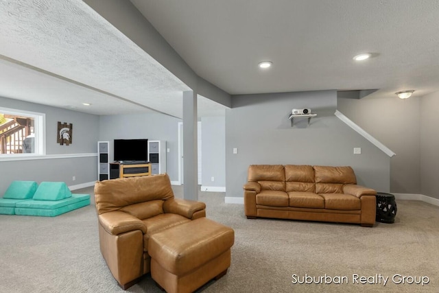 carpeted living room with recessed lighting, a textured ceiling, and baseboards