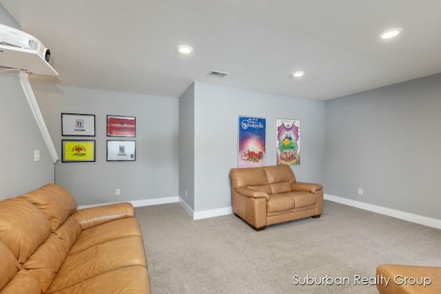 living room with recessed lighting, visible vents, light carpet, and baseboards