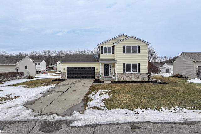 traditional home featuring an attached garage and driveway