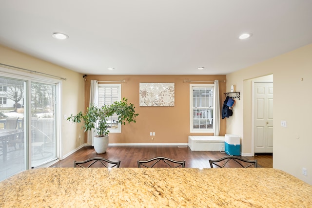 kitchen featuring recessed lighting, baseboards, and wood finished floors