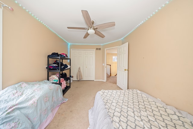 bedroom featuring carpet, visible vents, and ceiling fan