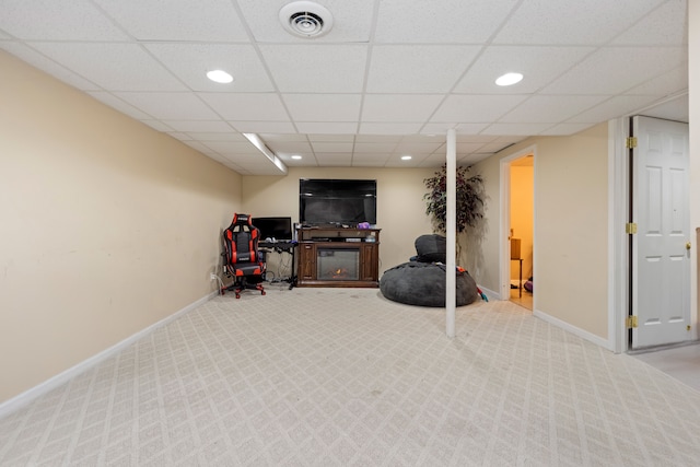 finished below grade area featuring recessed lighting, carpet flooring, visible vents, and baseboards