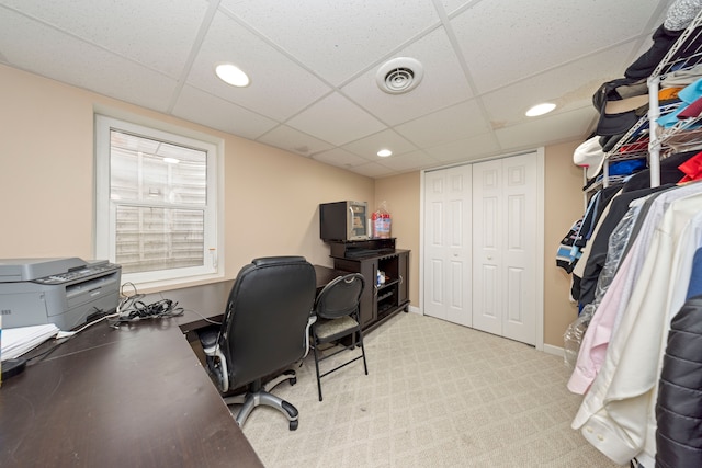 office space featuring light carpet, baseboards, visible vents, and recessed lighting