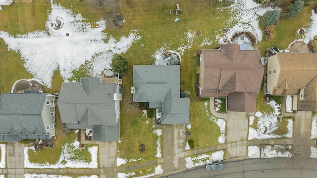 birds eye view of property with a residential view