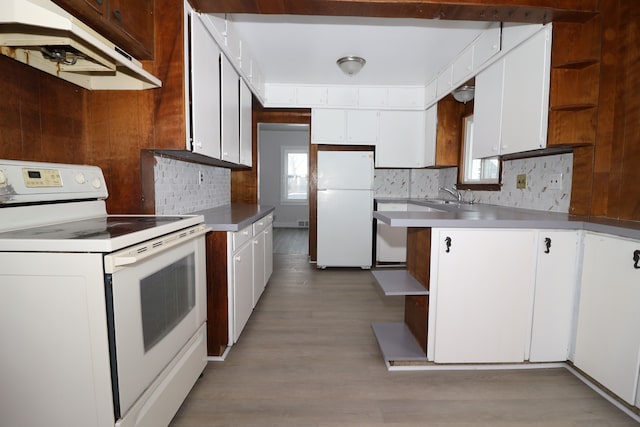 kitchen with white appliances, white cabinetry, and open shelves