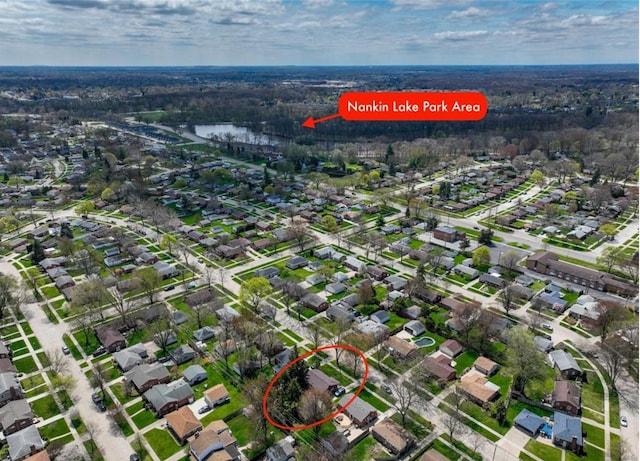 aerial view with a residential view and a water view