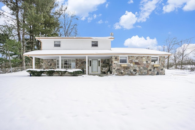 view of front of home with stone siding