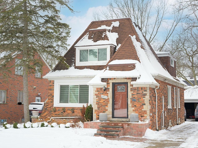 view of front of home featuring brick siding