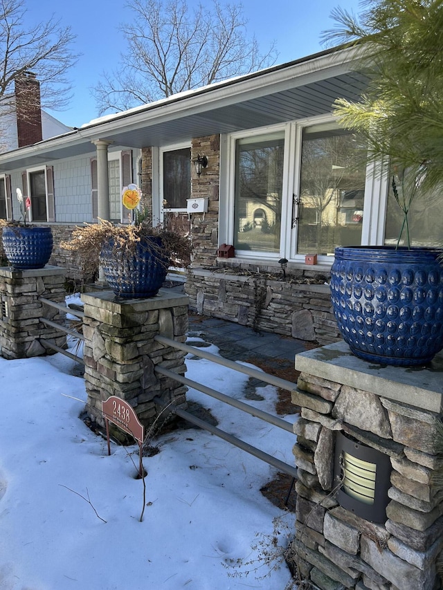 view of snow covered patio