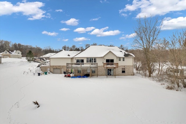 3912 Alex Ct, Oxford, MI 48371 - snow covered back of property with a balcony and brick siding