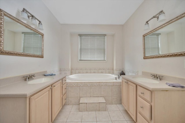 3912 Alex Ct, Oxford, MI 48371 - bathroom featuring tile patterned flooring, two vanities, and a bath