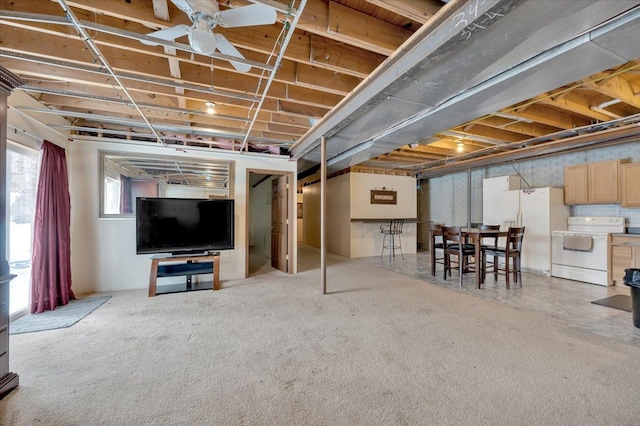 3912 Alex Ct, Oxford, MI 48371 - below grade area with freestanding refrigerator and ceiling fan
