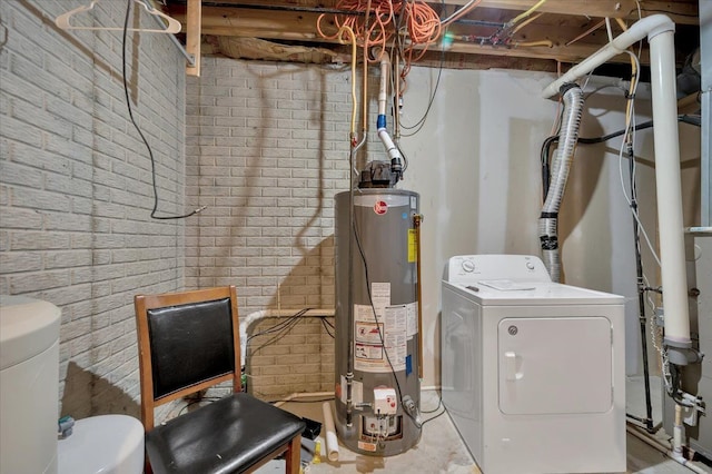 3912 Alex Ct, Oxford, MI 48371 - washroom featuring water heater, brick wall, and separate washer and dryer