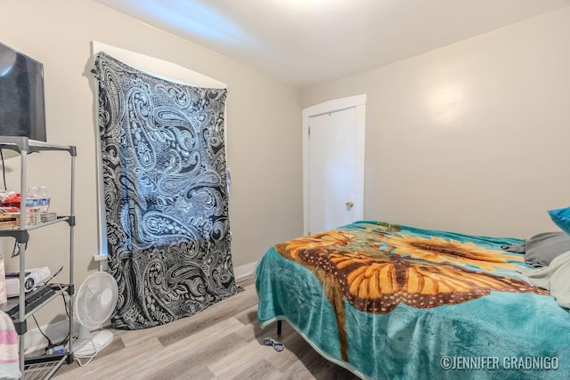 bedroom with light wood finished floors