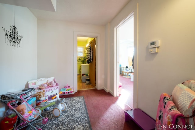 recreation room featuring carpet floors and a wealth of natural light