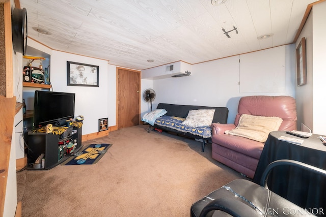 carpeted living area featuring visible vents