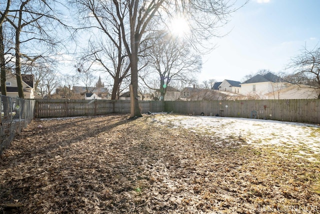 view of yard with a fenced backyard