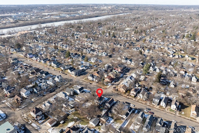 birds eye view of property with a residential view