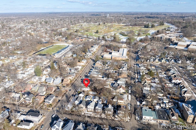 birds eye view of property with a residential view