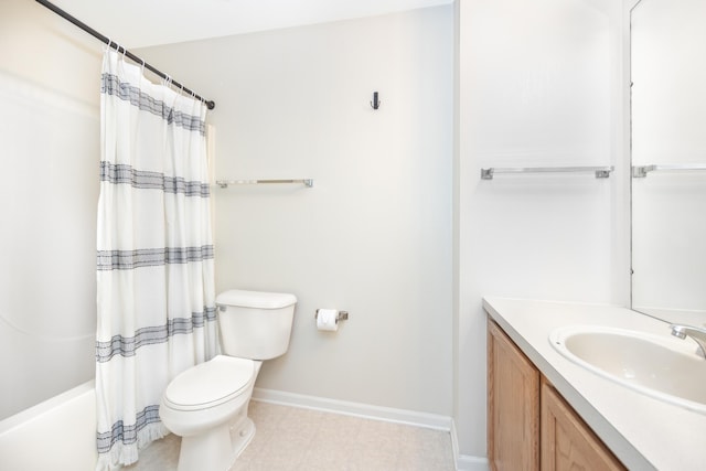 bathroom with toilet, shower / bath combination with curtain, vanity, and baseboards