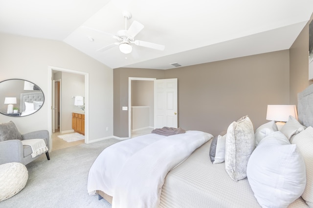 bedroom with light carpet, baseboards, visible vents, a ceiling fan, and vaulted ceiling