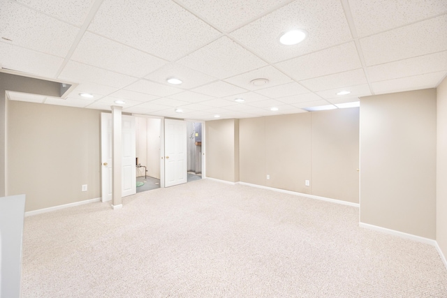 finished below grade area featuring carpet floors, recessed lighting, and baseboards