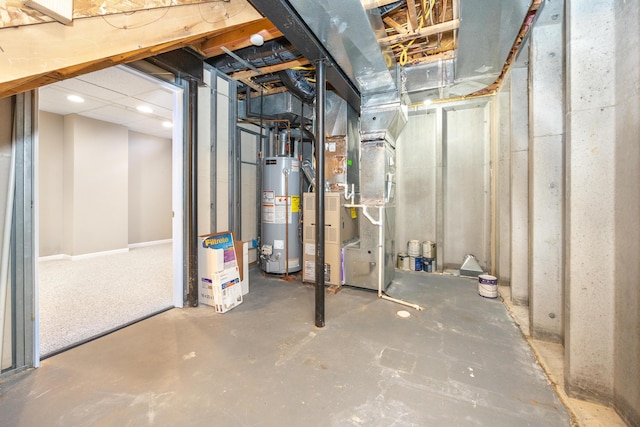 unfinished basement featuring heating unit and gas water heater