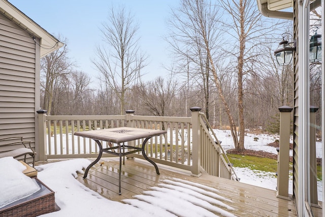 view of snow covered deck