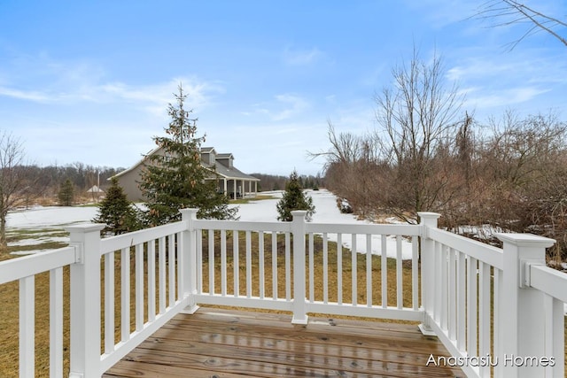 view of snow covered deck