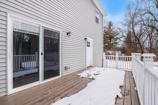 view of snow covered deck