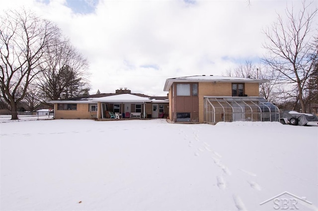 view of front facade featuring an outbuilding