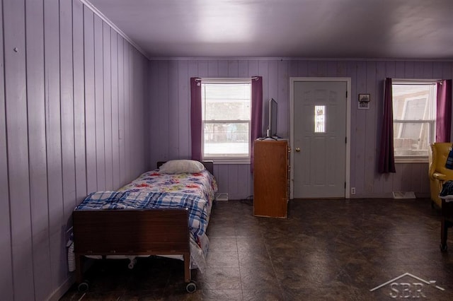 bedroom with crown molding