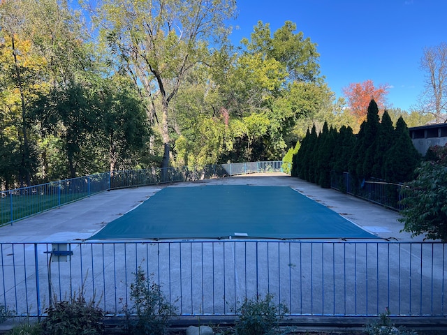 view of swimming pool with a fenced in pool, a patio area, and fence