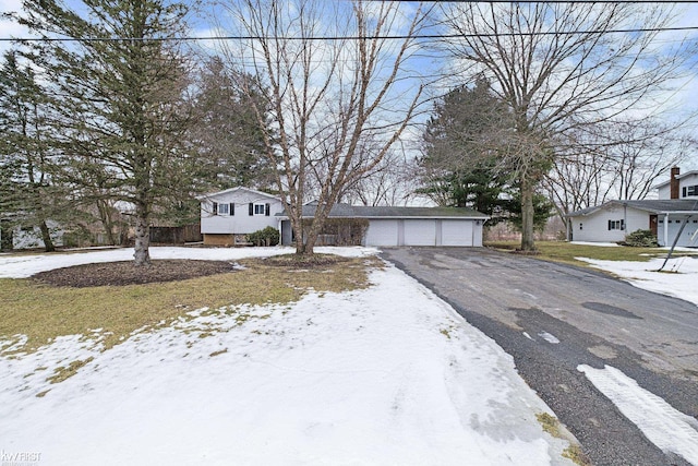 view of front of home featuring driveway and a residential view