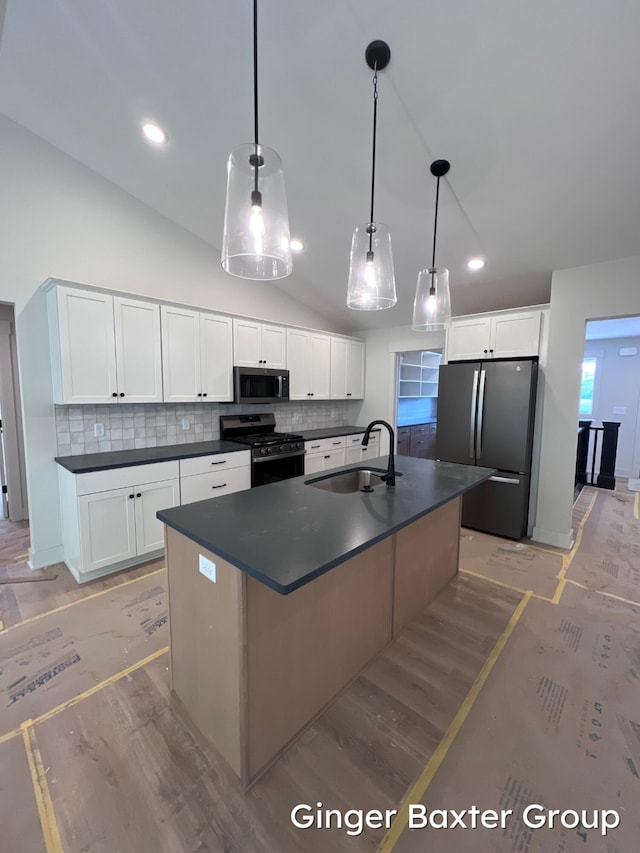 1910 Fallasburg Park Dr NE Unit 5, Lowell, MI 49331 - kitchen with a sink, stainless steel appliances, dark countertops, decorative backsplash, and vaulted ceiling
