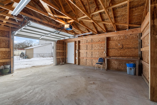 garage featuring a garage door opener