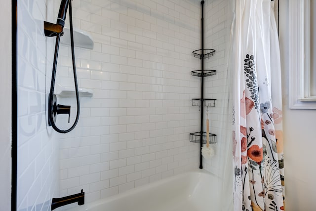 bathroom featuring shower / bath combination with curtain