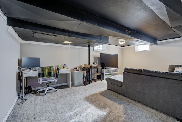 carpeted living area featuring baseboards